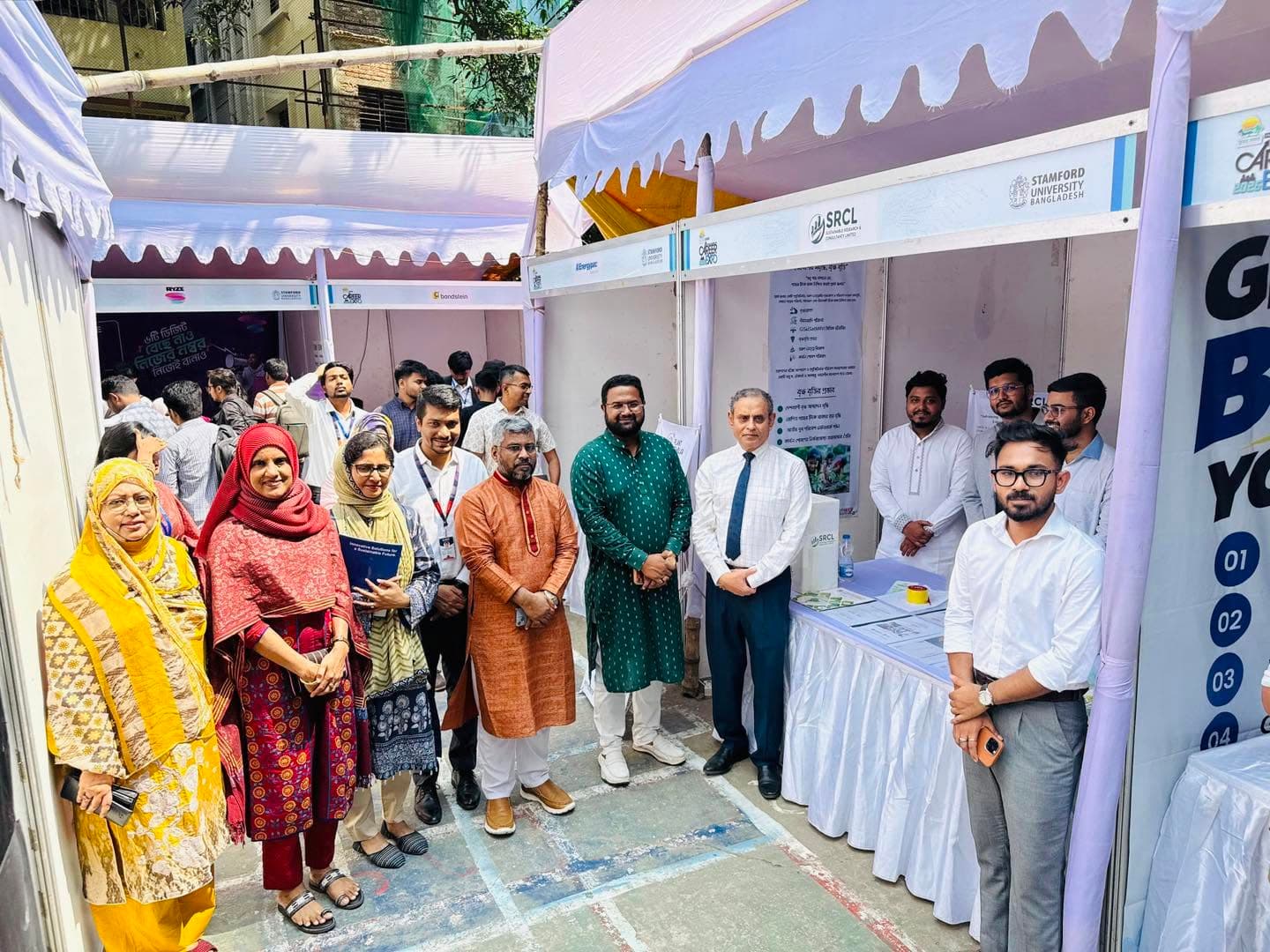 Md. Abu Jubayer and other attendees at SRCL’s booth at a Stamford University Bangladesh career expo